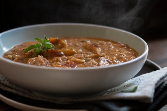 Hearty barley soup with sausages and sour cream